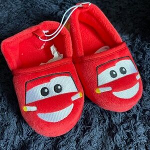 Never worn light McQueen slippers size 7/8 toddler